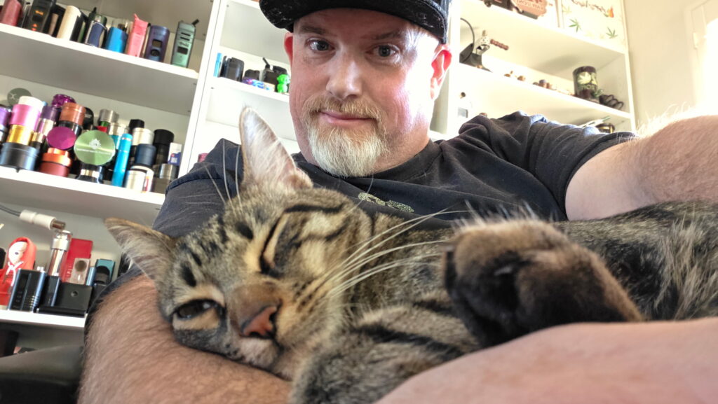 Troy aka 420vapezone with his cat, Haku