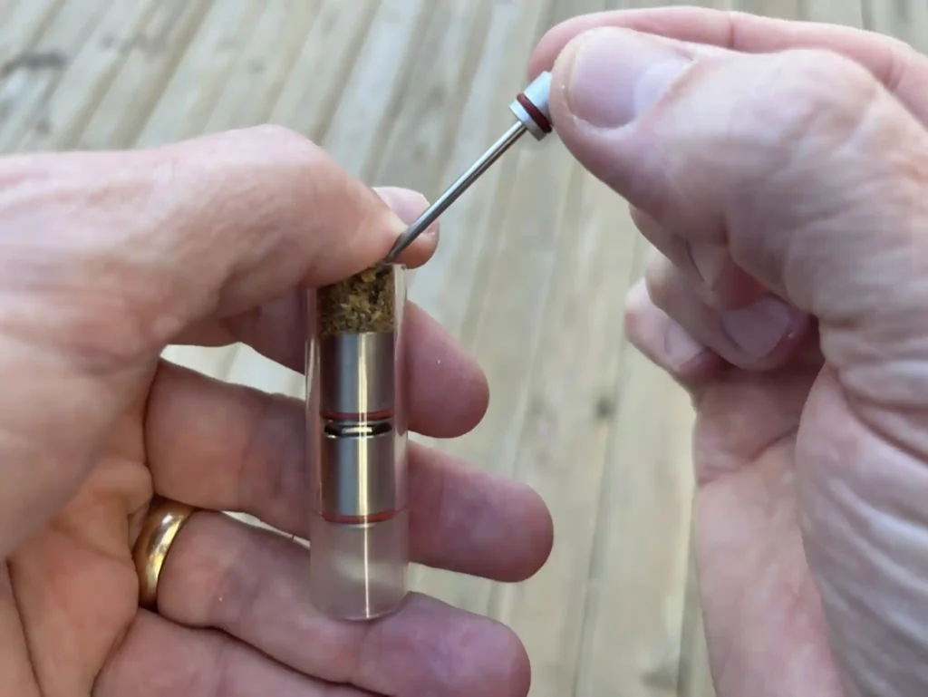 Packing the Tinymight 2 and stirring the bowl with the biult-in tool