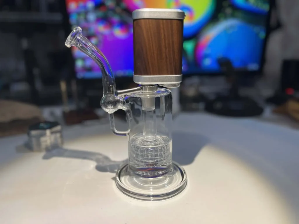 Tinymight 2 with glass water pipe adapter on a glass bubbler.