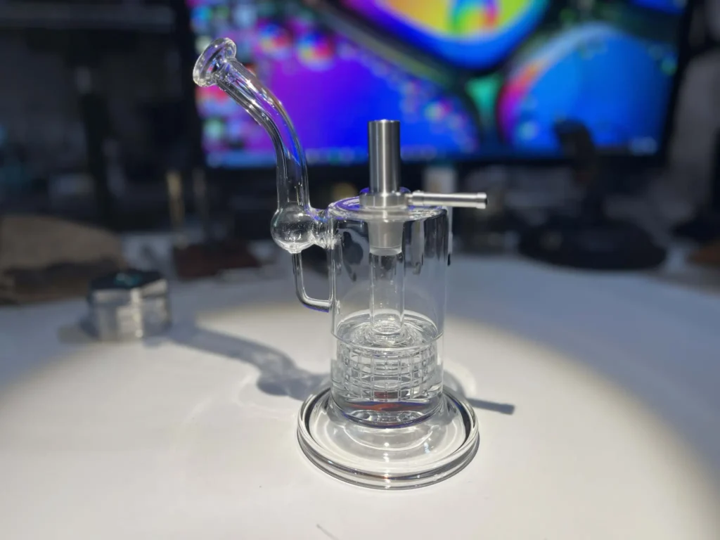 Glass bubbler with the Tinymight 2 water pipe adapter attached.