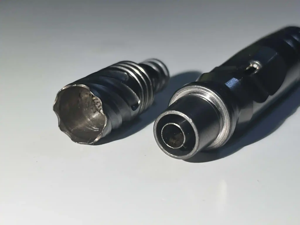Here the tip is pulled off and you can see the condenser tube from the top of the stem.