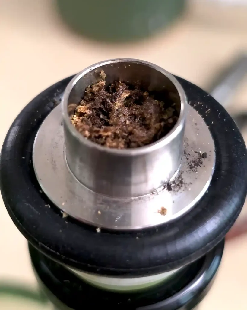 Hornet bowl with hash melted into dry herb
